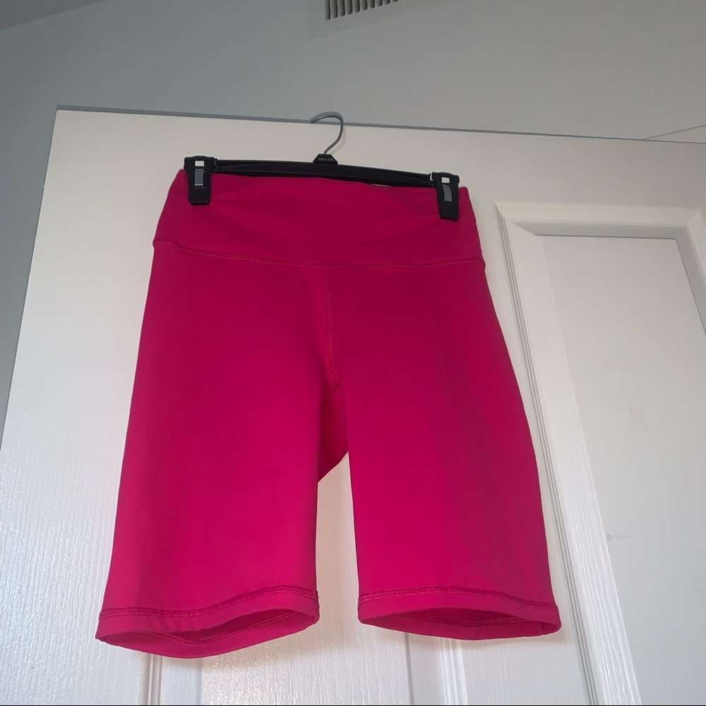Fabletics Powerhold Biker shorts in Hot pink